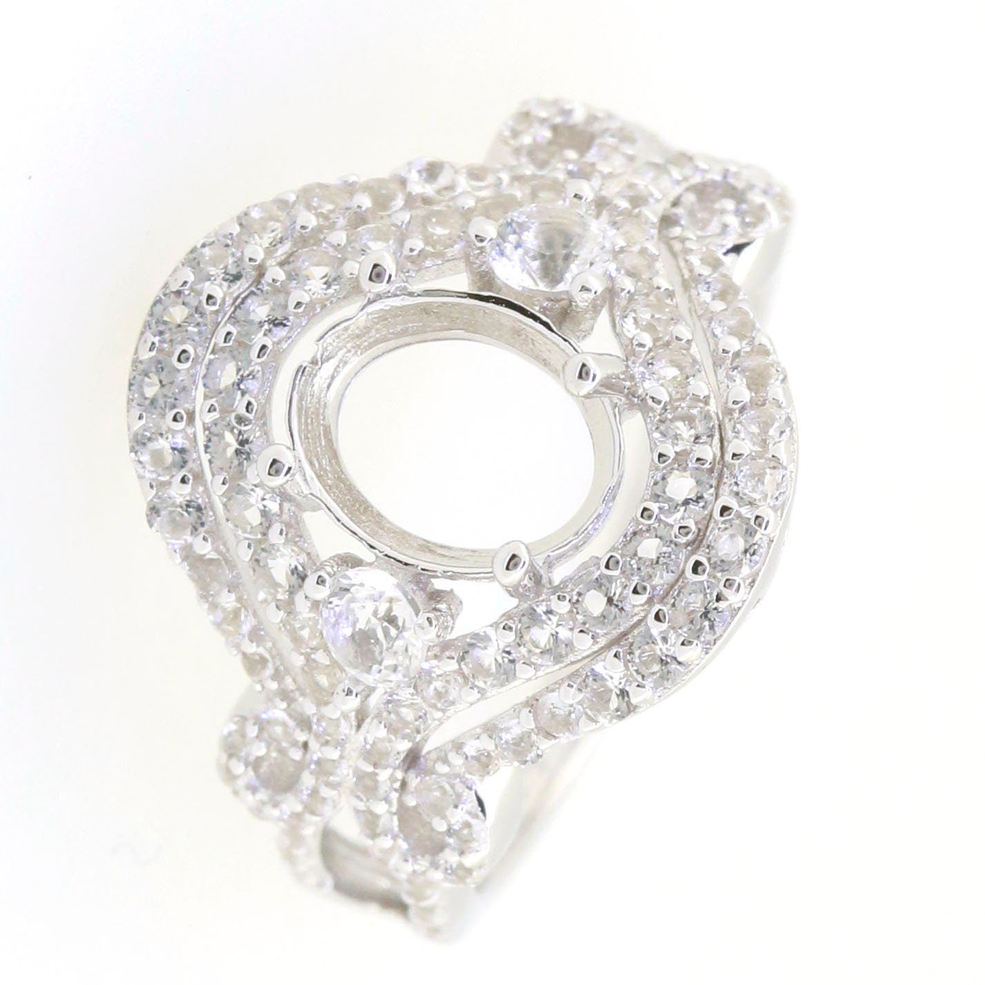 Sterling silver semi mount ring setting with double halo design for 9x7mm oval gemstone, adorned with white topaz.