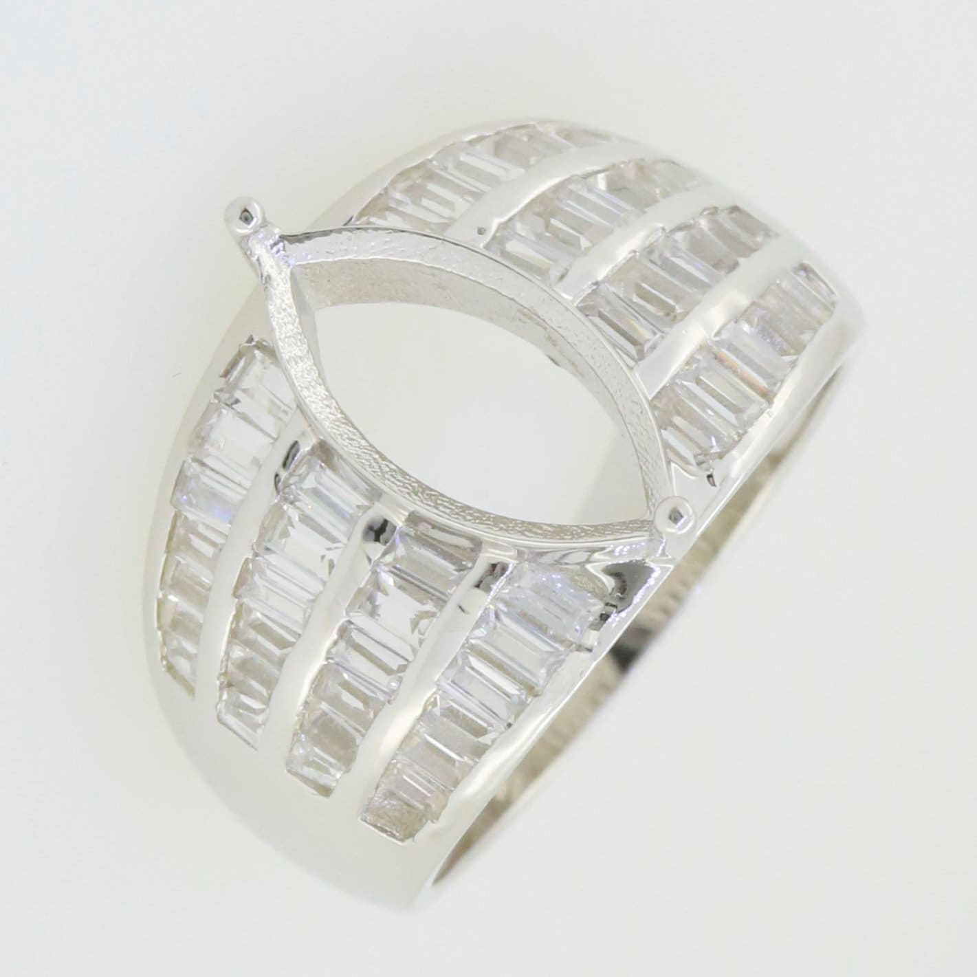 Sterling silver semi mount ring setting with marquise shape for engagement or wedding ring, showing intricate design.