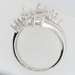 Sterling silver semi mount ring setting with delicate prong design for multiple stone arrangement.