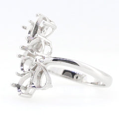 Sterling Silver Semi Mount Ring Setting designed for pear-shaped stones with a stylish bypass design.