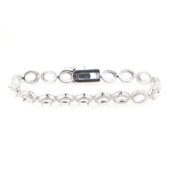 Sterling silver semi mount tennis bracelet setting with oval spaces for gemstones, featuring a stainless steel tongue clasp.