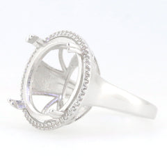 Sterling silver semi mount ring setting with halo design, ready for customization with white topaz side stones.