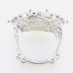 Sterling Silver semi mount ring setting for 16x12mm oval cabochon gemstone, featuring intricate design and adjustable base.