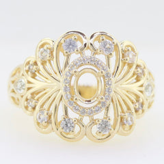 Gold semi mount ring setting with intricate design and white gemstones, perfect for custom gemstone placement.