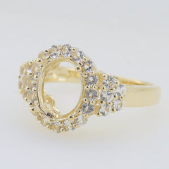 Sterling silver semi mount ring setting with oval center, adorned with sparkling white topaz gemstones, ready for customization.