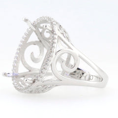 Sterling Silver semi mount ring setting with halo design for oval gemstones, featuring intricate detailing.