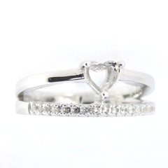 Sterling silver semi mount ring setting featuring a heart design and white topaz accent stones.