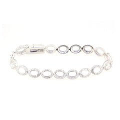 Sterling silver semi mount tennis bracelet setting with oval halo design and white topaz accents, made to order.