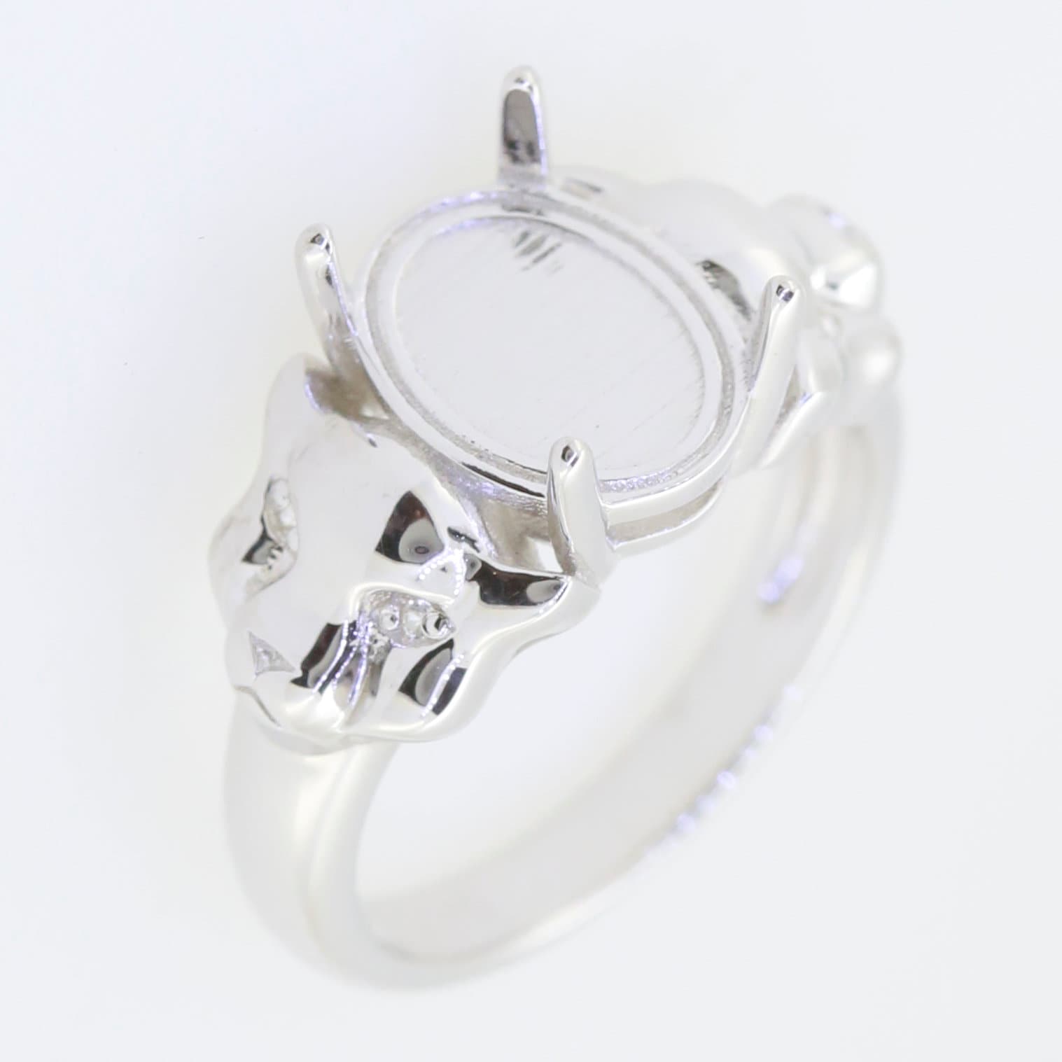 Sterling Silver Semi Mount Ring Setting with Oval Cabochon, featuring White Topaz in a unique design.