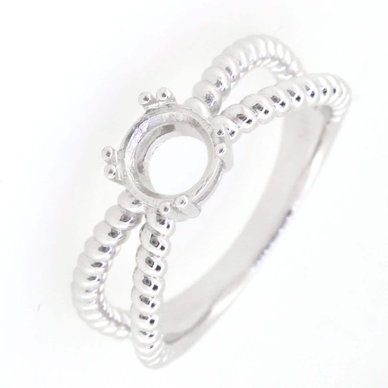 Sterling silver semi mount ring setting with split rope shank, designed for a round gemstone 6.5x6.5mm.