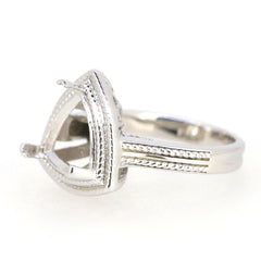 Sterling silver semi mount trillion ring setting with milgrain detailing for gemstones. Vintage style design.