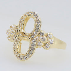 Gold ring featuring an elegant double oval design adorned with sparkling gemstones, perfect for unique jewelry lovers.