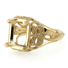 Art Deco style yellow gold semi mount ring setting for customizable gemstones, featuring intricate detailing.