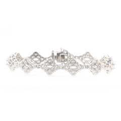 Sterling silver semi mount tennis bracelet setting with oval halo design and white topaz accents, made to order.