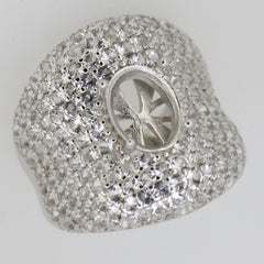 Sterling Silver Semi Mount Ring Setting featuring an oval opening and intricate white topaz accents, perfect for custom gemstone placement.
