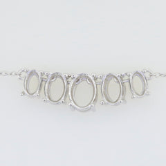 Sterling silver semi mount pendant setting with multiple oval stone cavities for custom gemstones.