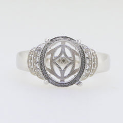 Sterling silver semi mount ring setting with halo design for oval 12x10mm gemstone and white topaz accent.