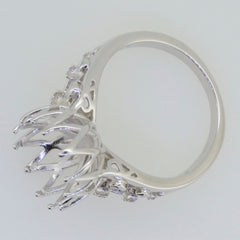 Sterling silver semi mount ring setting with white topaz, designed for custom gemstone sizes including oval and shapes.