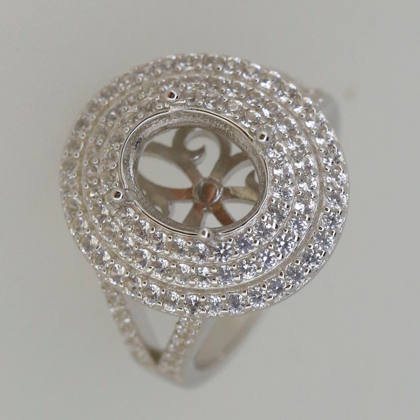 Sterling Silver Semi Mount Ring Setting with Triple Halo and White Topaz, designed for custom gemstone placement.