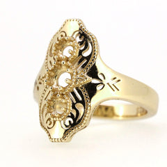 Elegant gold ring with intricate Art Deco design featuring floral motifs and a polished shine.