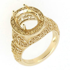 Sterling silver semi mount ring setting with filigree and milgrain details, designed for oval gemstones.