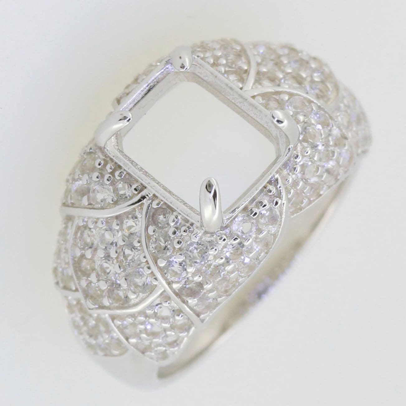 Sterling silver semi mount ring setting with white topaz accents, featuring a square center for custom gemstone placement.