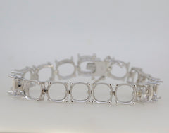 Sterling silver semi mount tennis bracelet setting with cushion for 10x10mm gemstone, stainless steel tongue for durability.