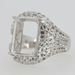 Sterling Silver semi mount ring setting with white topaz accents, designed for 14x10mm emerald gemstone.
