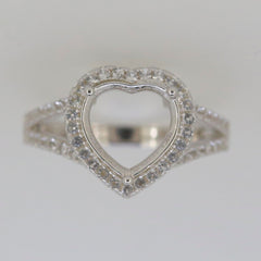 Sterling silver heart semi mount ring setting with white topaz accent, designed for customizable sizes.