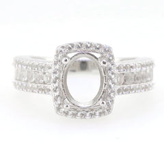 Sterling Silver Semi Mount Ring Setting with Oval Halo, adorned with White Topaz accents, ready for custom sizing.