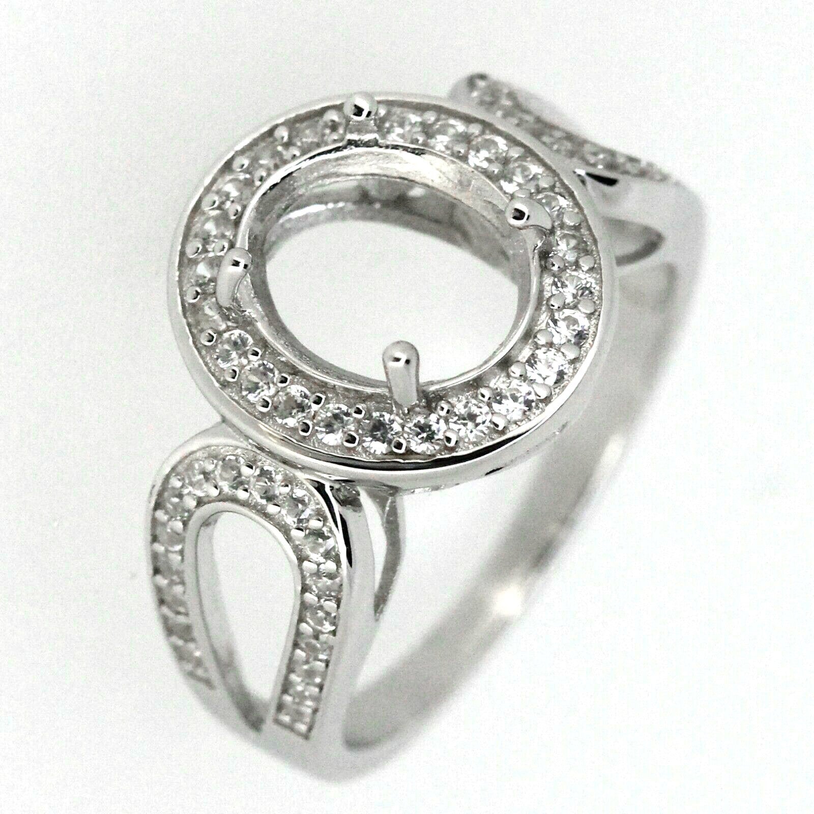 Sterling silver semi mount ring setting with oval stone holder and white topaz accent stones.