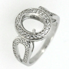 Sterling silver semi mount ring setting with oval stone holder and white topaz accent stones.
