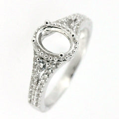Sterling silver semi mount ring setting with oval gemstone holder and white topaz accents for custom jewelry.