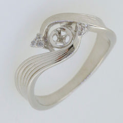 Sterling silver semi mount ring setting with accents, designed for a 6x6mm round pearl and white topaz.