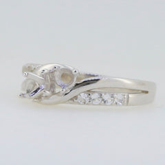 Sterling silver semi mount engagement ring setting with round 4x4mm gemstone placeholder and sparkling accents.