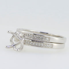 Sterling silver semi mount ring setting with round moissanite stones, featuring a unique design for customizable engagement options.