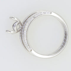 Sterling silver semi mount ring setting with round stone holder and elegant pave design for engagement rings.