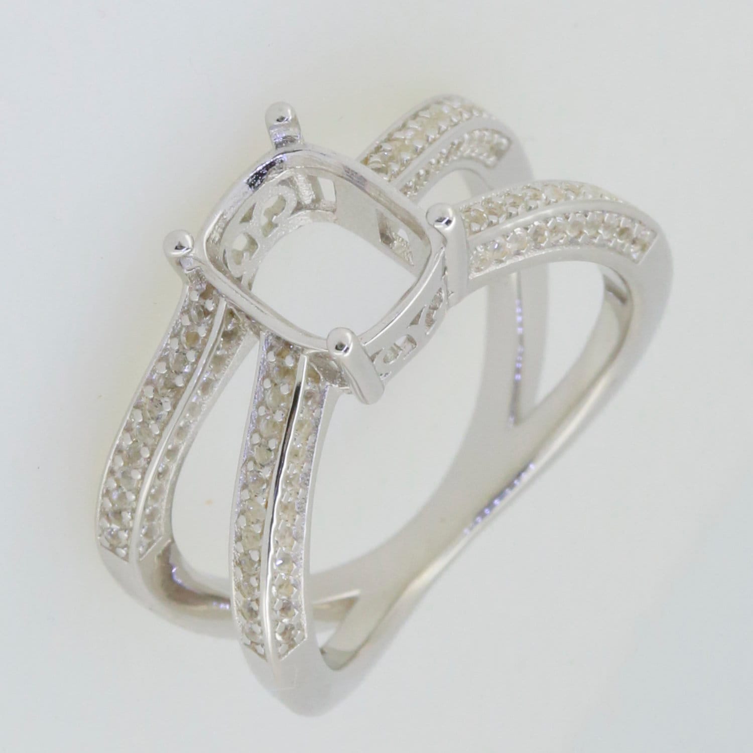 Sterling Silver semi mount ring setting with cushion halo and split shank, designed for 9x7mm gemstones.