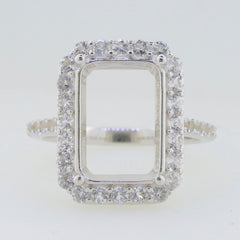 Sterling Silver semi mount ring setting with halo of D Color moissanite accents, designed for custom gemstone sizing.