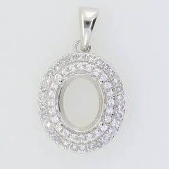 Sterling silver semi mount pendant setting oval with double halo of white topaz, crafted for custom gemstones.