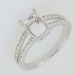 Sterling silver semi mount ring setting with cushion slot for 9x7mm white topaz and split shank design.