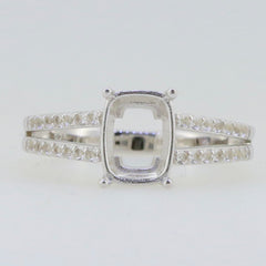 Sterling silver semi mount ring setting for cushion cut 9x7mm white topaz with split shank design.