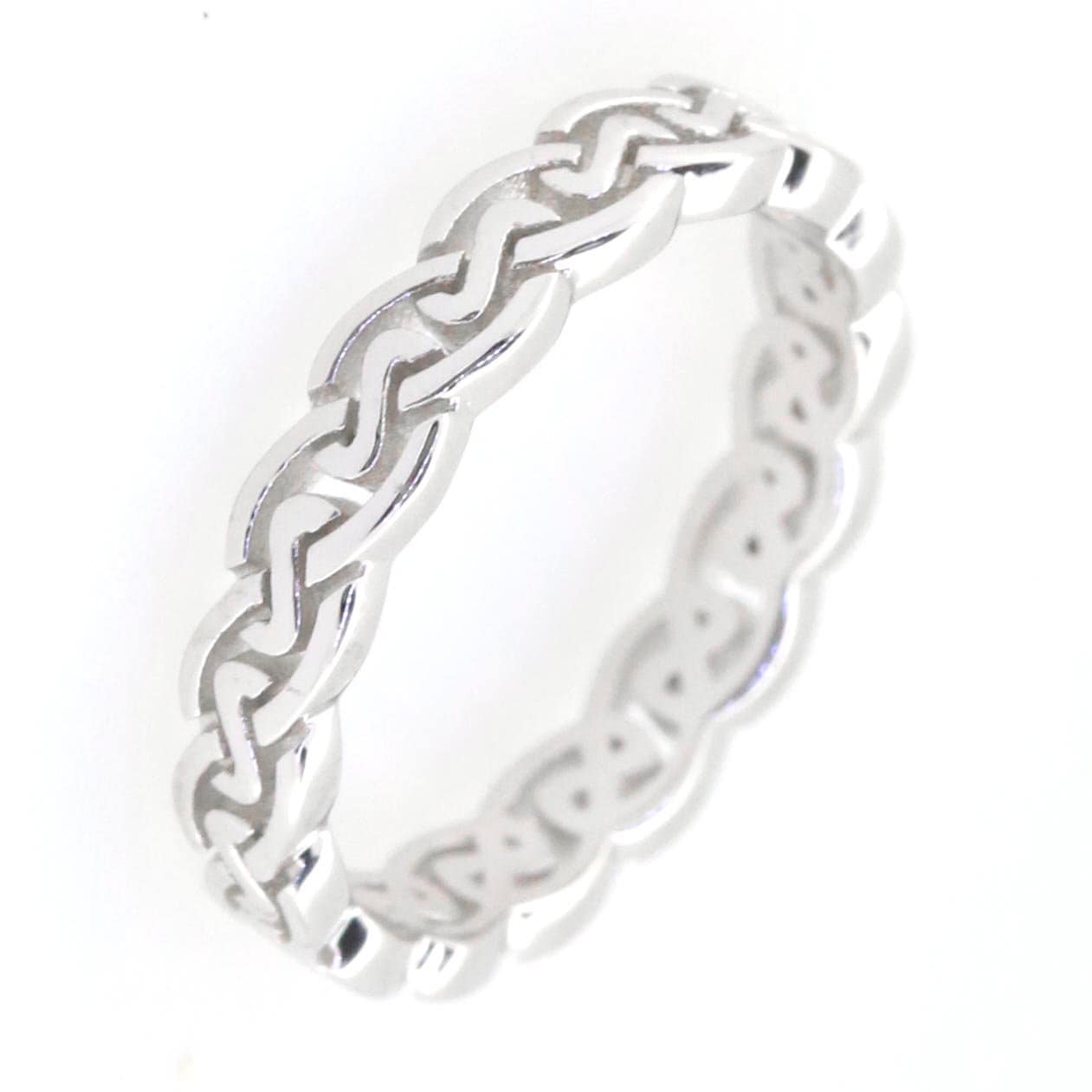 Sterling silver Celtic knot band engagement wedding ring, intricately designed with an infinity braid pattern.