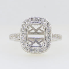 Sterling silver semi mount ring setting with halo design for 10x8mm cushion cut, featuring D color moissanite accents.