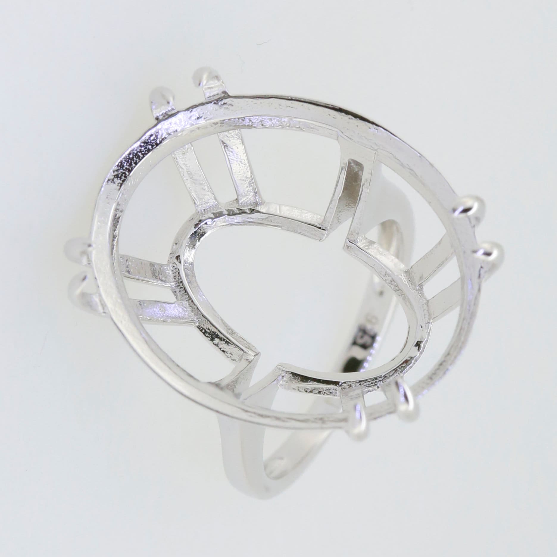 Sterling Silver Semi Mount Ring Setting designed for Oval gems, featuring intricate details and a lightweight structure.