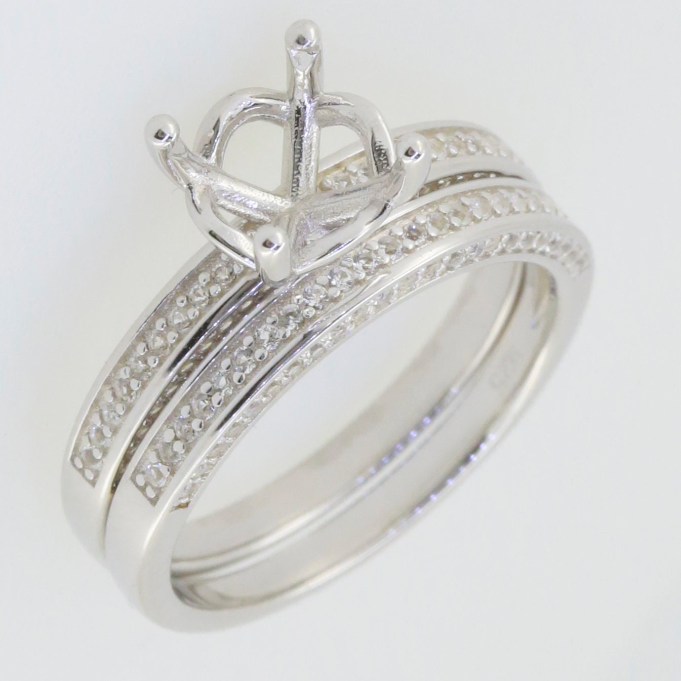Sterling Silver Semi Mount Ring Setting with a crown design, featuring round D color VVS moissanite accents.