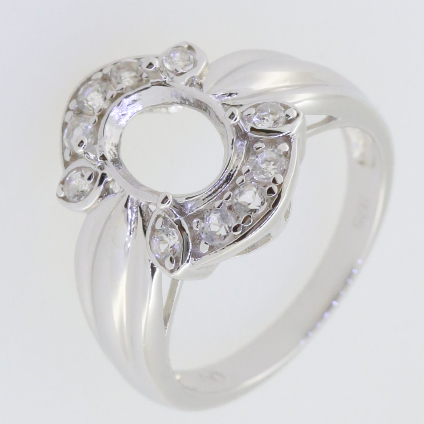 Sterling silver semi mount ring setting with moissanite accents for 9x7mm oval gemstone, customizable and made to order.