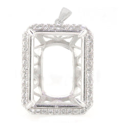 Sterling Silver semi mount pendant setting for 20x15mm emerald with halo of white topaz accents.