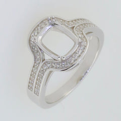 Sterling silver semi mount ring setting with cushion center, white topaz halo, and split shank design.