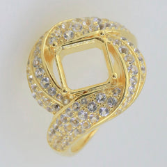Gold wrapped ring setting with square center and sparkling accents, perfect for custom gemstone mounting.